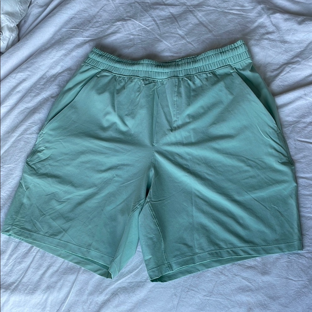 Men’s teal pace breaker lululemon shorts